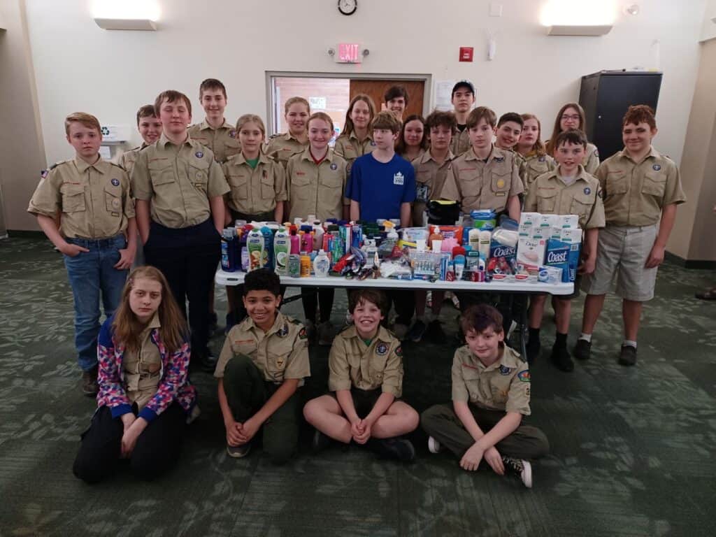 Troop 390 Scouts with the donations collected for Haven of Rest Easter Hope Totes