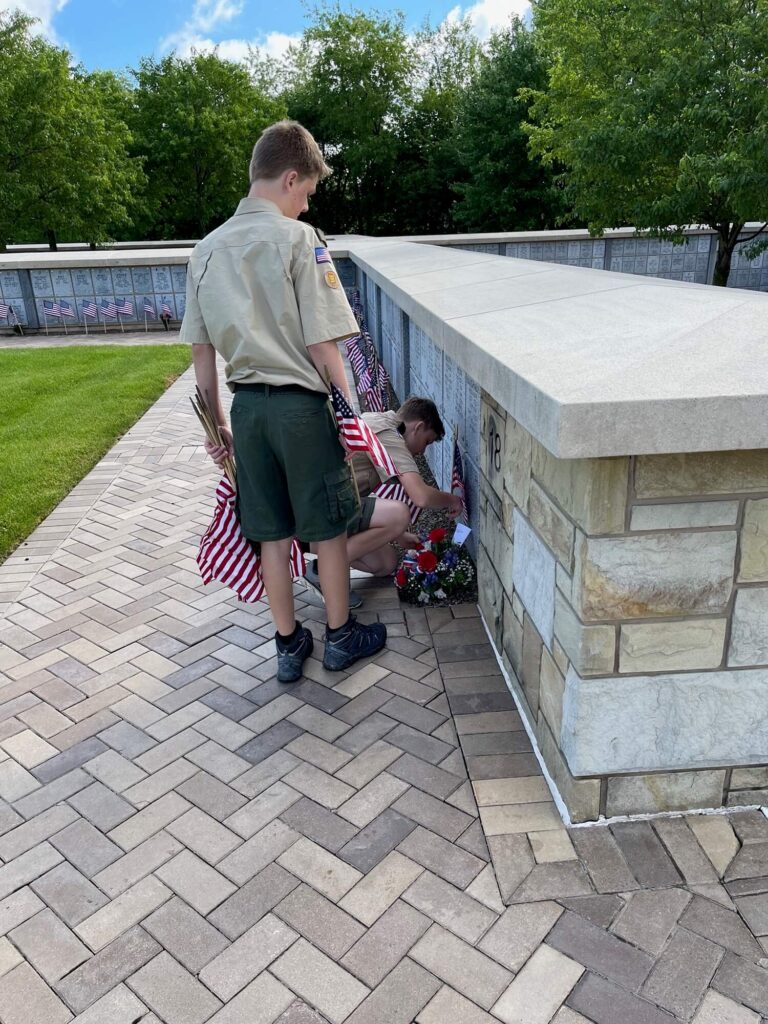 Troop 390 scouts planting flags at Ohio Western Reserve National Cemetery