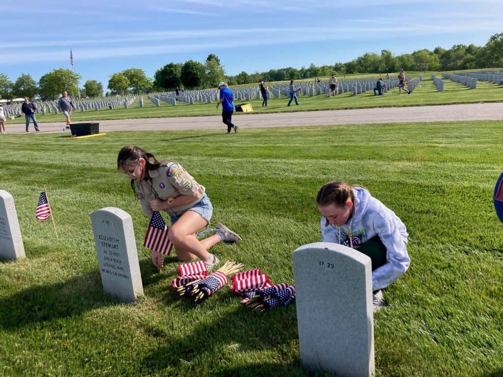planting flags at Ritman National Cemetery